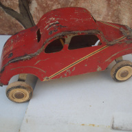 TC CHAPA 30 X14 CM CON SUSPENCION DE FABRICA DE JUGUETES ECONOMICOS DECADA DEL 50